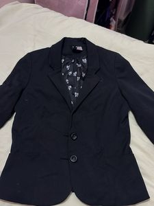 Chic Black Blazer with Bow Lining