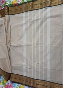 Elegant Beige Saree with Golden and  Border