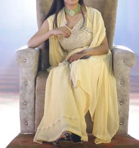 Elegant Yellow Ethnic Gown with cape and padded
