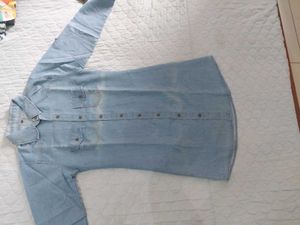 Light Wash Denim one piece with open buttons