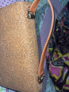 Elegant Embossed Clutch and sling bag