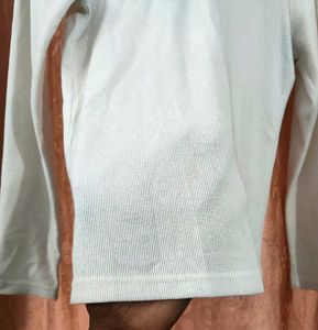 Ruffled Mock Neck Long Sleeve Top
