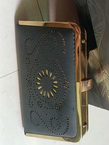 Elegant Black Clutch with Gold Trim