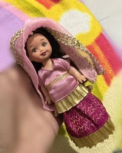 Ethnic Doll and a cow plushie