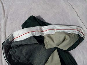 fitted dark green trousers (unisex)