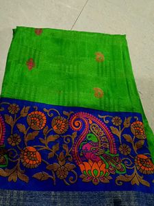Vibrant Green Silk Saree with Blue Border