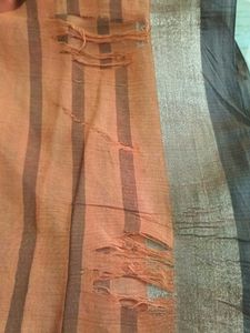 Orange Striped Saree with small mistake