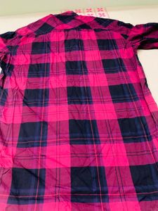 red check shirt with tag
