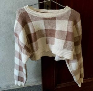 its a short woolen sweater