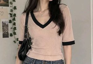 Beige Ribbed V-Neck Top with Black Trim