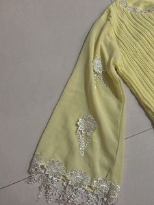 Yellow Pleated Blouse with Silver Embellishments