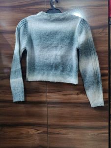 Stylish grey and white sweater