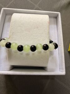 Set of 4 Beaded Bracelets with Charm