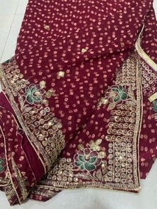 Maroon Bandhani Saree with Gold Border