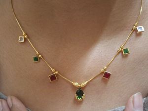 Gold Necklace with Gemstone Pendants