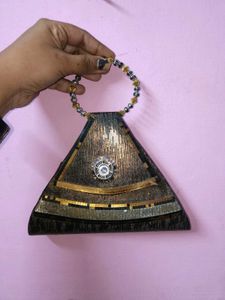 Unique Triangle Clutch with Embellishments