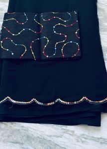 Elegant Black Saree with Colorful Border