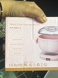 Pink Wax Heater Machine