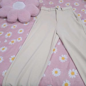 Beige High-Waist Women's trousers.