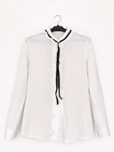 White Ruffled Blouse with Black Ribbon