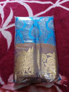 Blue Silk Saree with Gold Border