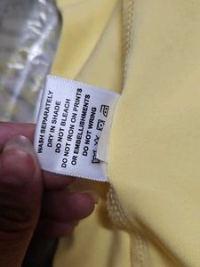 Elegant Yellow Sleeveless Wrap Dress