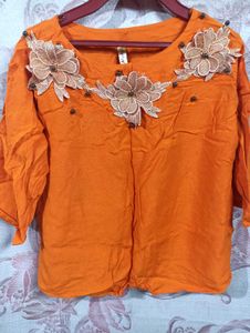 Vibrant Orange Kurta with Floral Embellishments