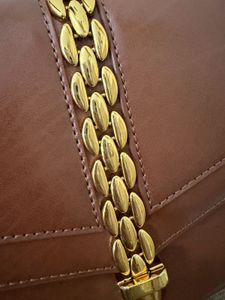 Stylish Brown Shoulder Bag with Gold Chain Detail