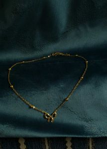 Delicate Gold Bow Necklace