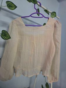 cream blouse tied top