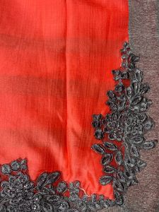 Vibrant Coral Saree with Embellished Border