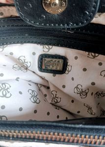 Authentic Guess Black Ostrich Embossed bag