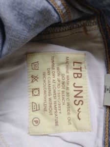 Distressed Blue Denim Jeans