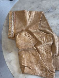 Elegant Orange Saree with Intricate Border