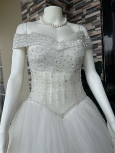Elegant White Off-Shoulder Wedding Gown