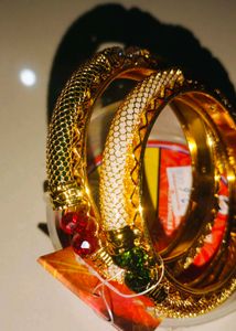 Brand new Elegant Gold Bangles with Red Stones