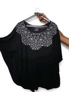 Elegant Black Tunic with Unique Neckline