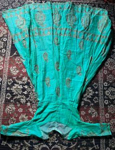 Beautiful Teal Ethnic Gown with Gold Print know an