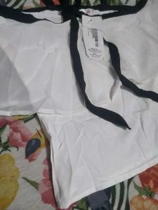 Chic White Cold Shoulder Top with Black Trim