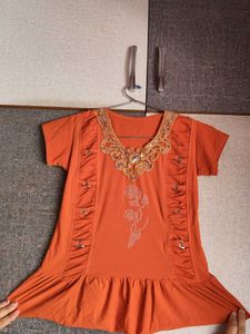 Orange Embellished top