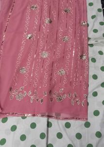 Elegant Pink Saree with Embellishments