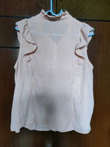 Chic Pink Ruffled Sleeveless Blouse