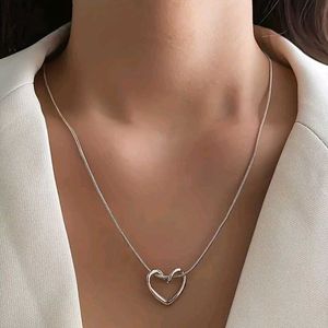 ✨ Elegant Heart Knot Pendant 💖