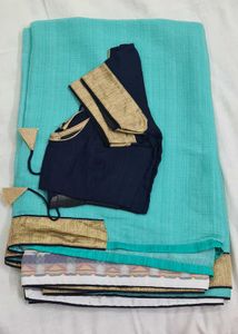 Beautiful Teal Saree with Gold Border