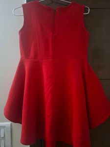 Red Textured Peplum Top with Key Pendant