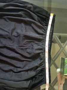 Tonal black side stripe shorts.