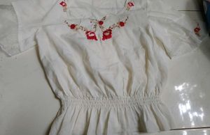 Embroidered Peplum Top with Ruffle Sleeves