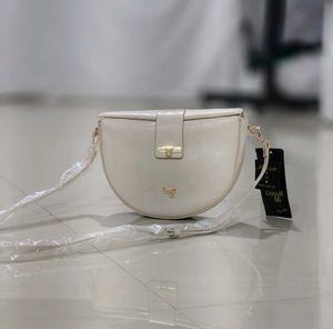 Baggit half moon sling bag