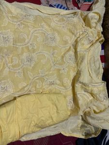 Elegant Yellow Kurta Set with Intricate Embroidery