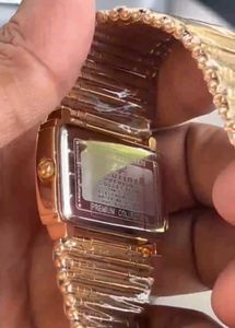 Elegant Gold Watch with Diamond Accents